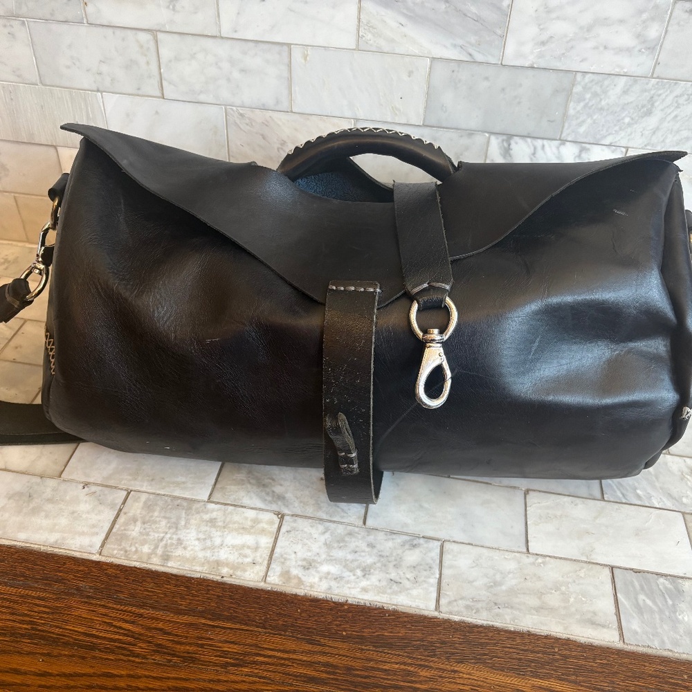 Black leather handmade carry on luggage